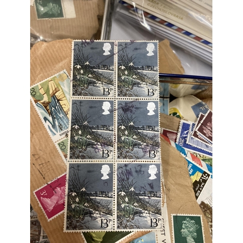 468 - A COLLECTION OF WORLDWIDE AND BRITISH LOOSE STAMPS AND A COMPLETE ALBUM