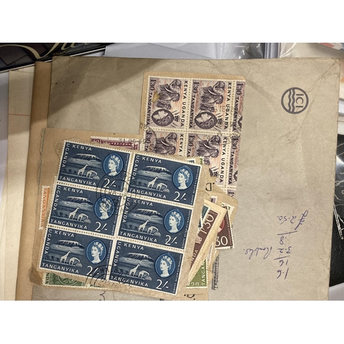 468 - A COLLECTION OF WORLDWIDE AND BRITISH LOOSE STAMPS AND A COMPLETE ALBUM