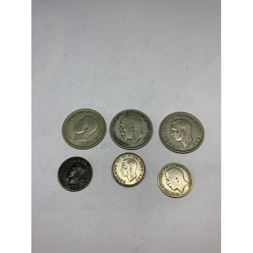 491 - SIX COINS TO INCLUDE THREE HALF CROWNS 1932, 1940, 1942 AND THREE SHILLINGS 1921, 1941 AND 1942