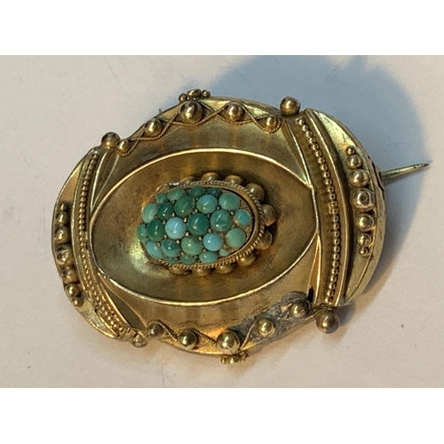 518 - A TESTED TO 9 CARAT GOLD BROOCH LOCKET WITH TURQUOISE STONES GROSS WEIGHT 9.69 GRAMS