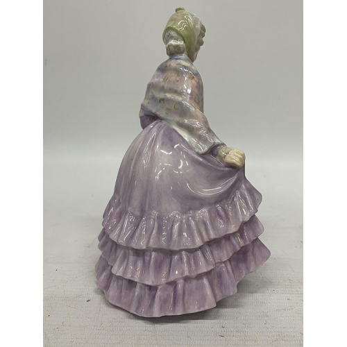 740 - A ROYAL DOULTON FIGURE OF A GENTLEWOMAN HN1632