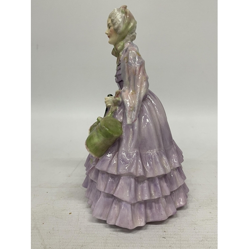 740 - A ROYAL DOULTON FIGURE OF A GENTLEWOMAN HN1632