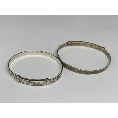 541 - FOUR SILVER CHILDRENS BANGLES