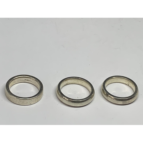 645 - FIVE SILVER BAND RINGS