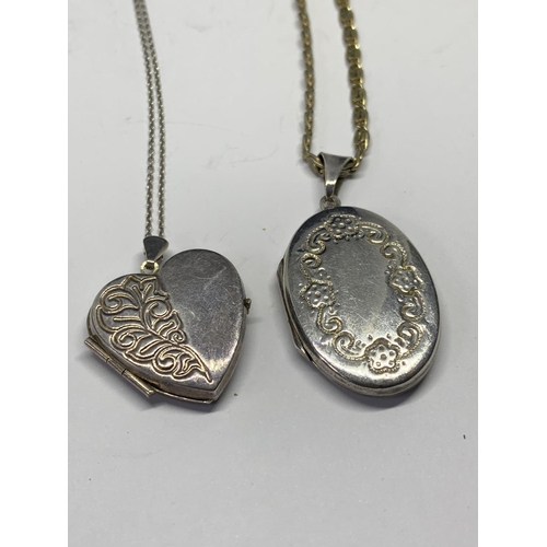 649 - TWO SILVER NECKLACES WITH LOCKETS TO INCLUDE A HEART SHAPED AND OVAL