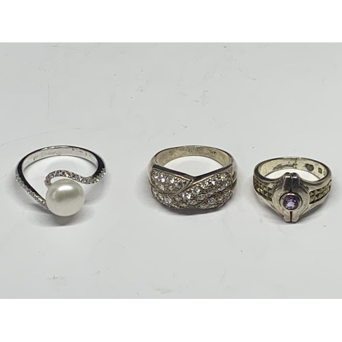 658 - FIVE VARIOUS SILVER RINGS