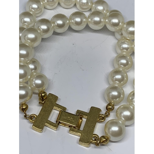 661 - A NAPIER PEARL BRACELET AND A PAIR OF MONET PEARL CLIP ON EARRINGS