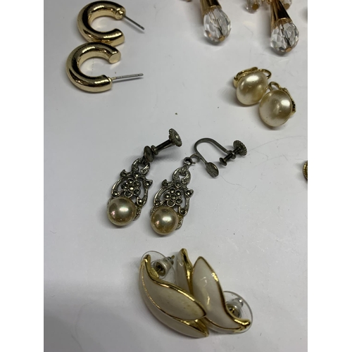 667 - ELEVEN PAIRS OF COSTUME JEWELLERY EARRINGS