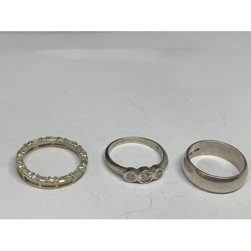 668 - FIVE VARIOUS SILVER RINGS