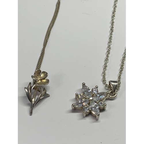 672 - FOUR SILVER NECKLACES WITH PENDANTS