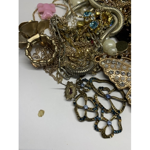 698 - A LARGE QUANTITY OF COSTUME JEWELLERY