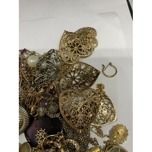 698 - A LARGE QUANTITY OF COSTUME JEWELLERY