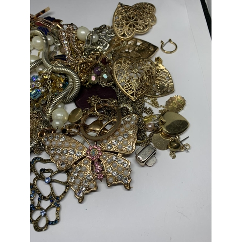 698 - A LARGE QUANTITY OF COSTUME JEWELLERY