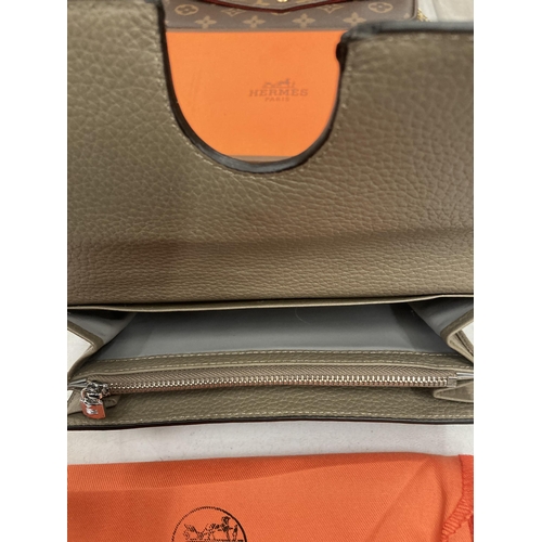 259 - A TAUPE COLOURED PURSE MARKED 'HERMES' WITH DUST COVER AND BOX