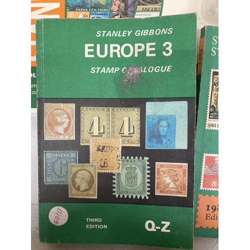 483 - VARIOUS ITEMS TO INCLUDE TWO STANLEY GIBBONS STAMP BOOKS 1995 - 2001, FIVE STAMP MAGAZINES, SIX STAM... 