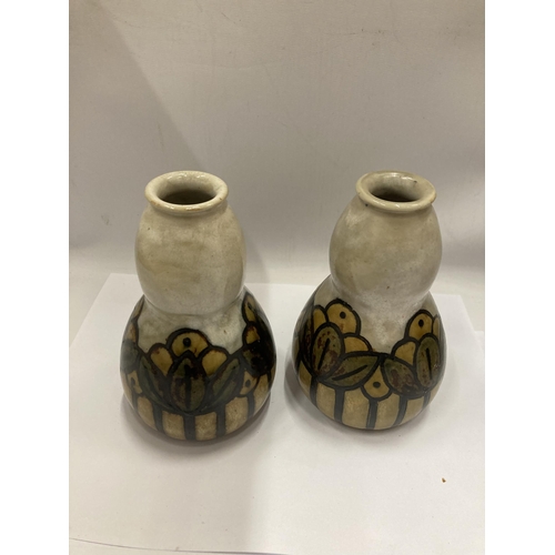 87 - A PAIR OF EARLY ROYAL DOULTON VASES