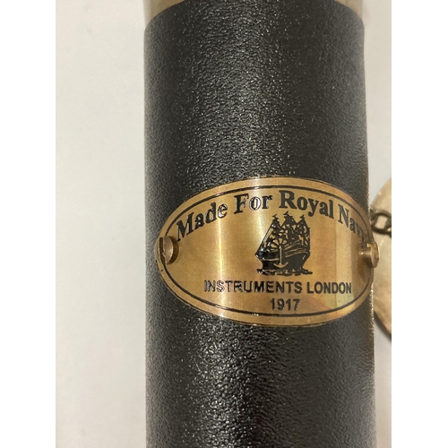 93 - A BRASS AND LEATHER ROYAL NAVY TELESCOPE