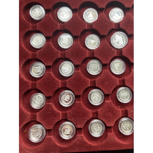 349A - A TRAY CONTAINING FORTY X 1 GRAM PURE SILVER COINS .