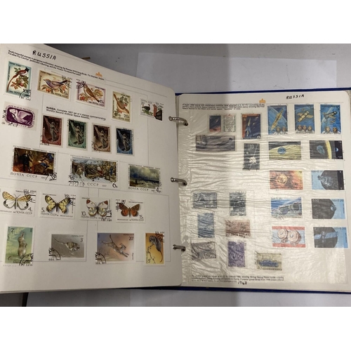 412A - THE ROYAL FAMILY STAMP ALBUM OF WORLD STAMPS - RUSSIA, MONGOLIA. VAE ETC