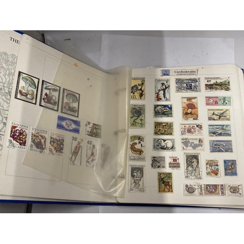 413A - THE ROYAL FAMILY STAMP ALBUM OF WORLD STAMPS - HUNGARY, CUBA, POLAND ETC