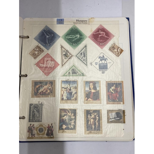 413A - THE ROYAL FAMILY STAMP ALBUM OF WORLD STAMPS - HUNGARY, CUBA, POLAND ETC