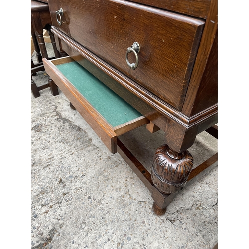 2963 - AN EARLY 20TH CENTURY OAK BUREAU ON OPEN BASE, 28