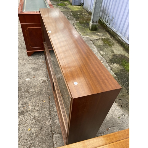 2974 - A MID 20TH CENTURY BEAVER & TAPLEY BOOKCASE WITH FOUR SLIDING DOORS, TWO BEING GLASS, 60