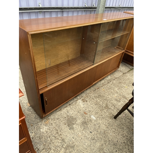 2974 - A MID 20TH CENTURY BEAVER & TAPLEY BOOKCASE WITH FOUR SLIDING DOORS, TWO BEING GLASS, 60