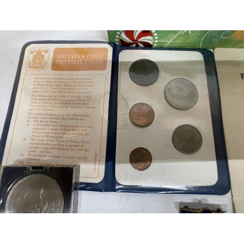 439A - A QUANTITY OF ITEMS TO INCLUDE FOREIGN COINS, BRITISH COINS, COMMEMORATIVE CROWNS, POSTCARDS, MEDALS... 