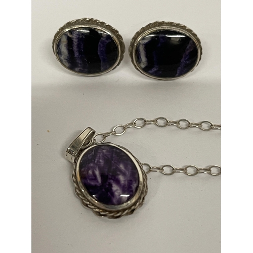 700 - A SILVER AND PURPLE STONE PENDANT WITH MATCHING EARRINGS