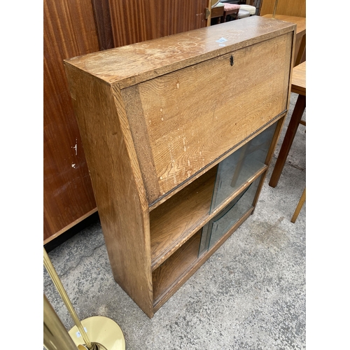 2652 - A RETRO OAK BOOKCASE WITH SLIDING GLASS DOORS, 33