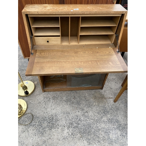 2652 - A RETRO OAK BOOKCASE WITH SLIDING GLASS DOORS, 33