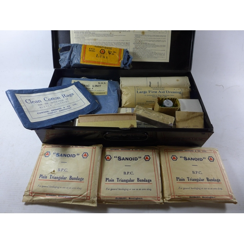 356 - A BLACK PAINTED WORLD WAR II A.R.P. HOME FIRST AID KIT, COMPLETE WITH BANDAGES ETC