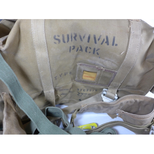 373 - A WORLD WAR II AIRCRAFT SURVIVAL PACK, TWO HESSIAN POUCHES, BELTS, STRAPS ETC