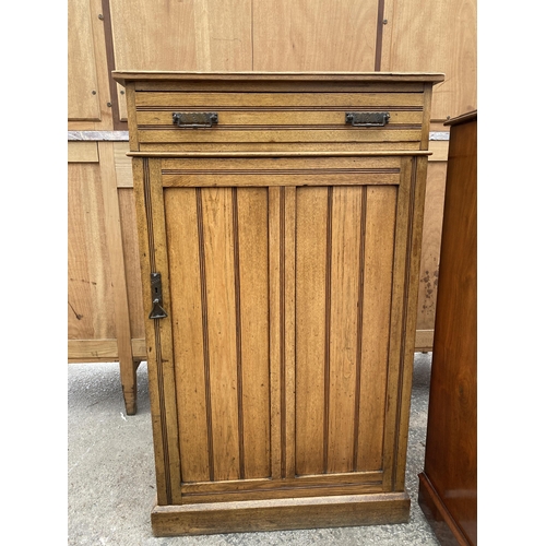 2575 - AN ART NOUVEAU INFLUENCE CUPBOARD WITH SINGLE DRAWER, 27