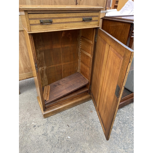 2575 - AN ART NOUVEAU INFLUENCE CUPBOARD WITH SINGLE DRAWER, 27