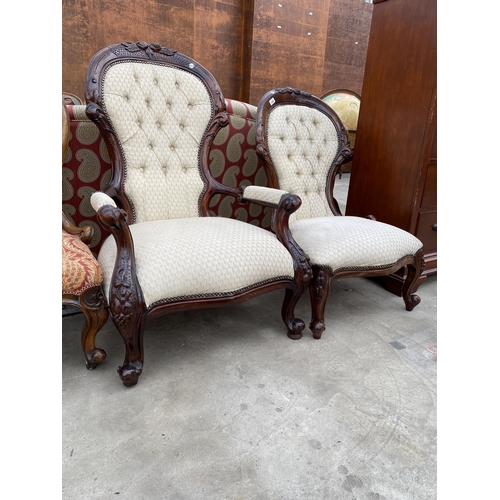 2588 - A VICTORIAN STYLE LADIES AND GENTLEMAN'S LOUNGE CHAIRS, ONE WITH OPEN ARMS, BOTH HAVING CARVING AND ... 