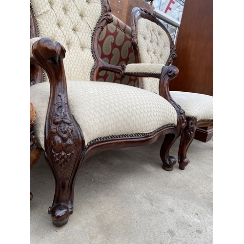 2588 - A VICTORIAN STYLE LADIES AND GENTLEMAN'S LOUNGE CHAIRS, ONE WITH OPEN ARMS, BOTH HAVING CARVING AND ... 