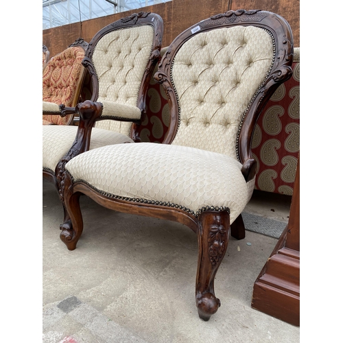 2588 - A VICTORIAN STYLE LADIES AND GENTLEMAN'S LOUNGE CHAIRS, ONE WITH OPEN ARMS, BOTH HAVING CARVING AND ... 