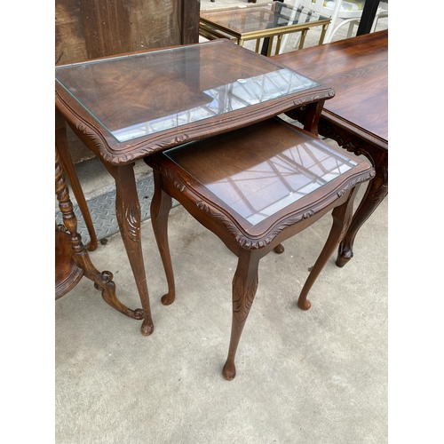 2595 - A MODERN HARDWOOD COFFEE TABLE AND NEST OF TWO TABLES