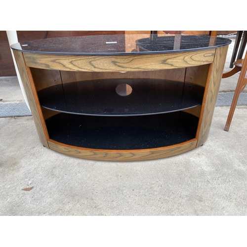 2600 - A MODERN OVAL TV STAND WITH THREE TIER GLASS SHELVES