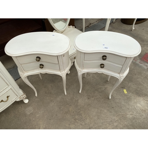 2603 - A PAIR OF MODERN WHITE AND GILT KIDNEY SHAPED BEDSIDE TABLES WITH TWO DRAWERS