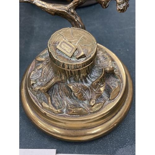 126 - A VINTAGE NOVELTY BRASS INKWELL WITH A SINGING BOY IN A TREE