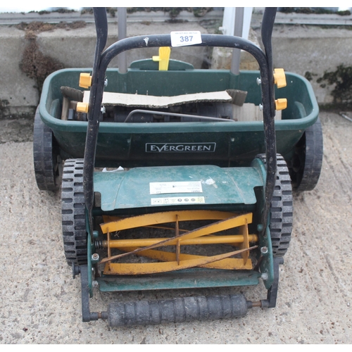 387 - A HAND MOWER & A HAND SEED SOWER NO VAT