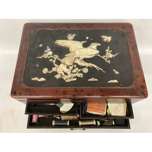 40 - A JAPANESE LACQUERED SEWING BOX AND CONTENTS WITH BIRD DESIGN TOP AND INNER COMPARTMENTS AND LOWER D... 