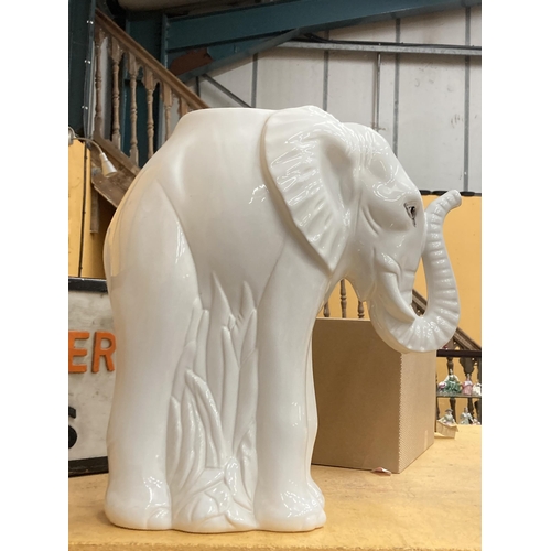 51 - A LARGE WHITE CERAMIC ELEPHANT STICK STAND