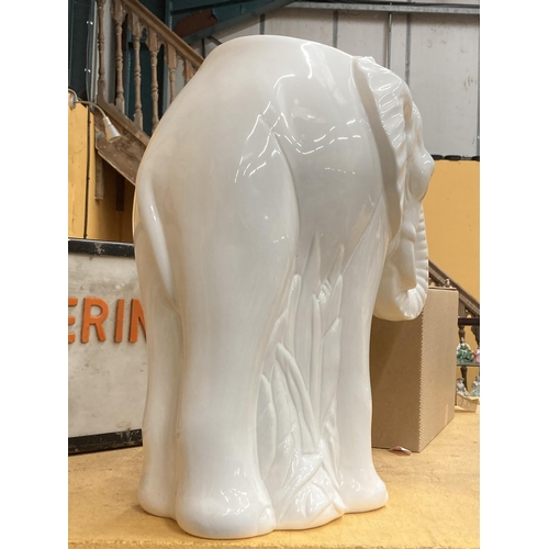 51 - A LARGE WHITE CERAMIC ELEPHANT STICK STAND