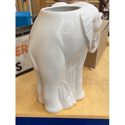 51 - A LARGE WHITE CERAMIC ELEPHANT STICK STAND