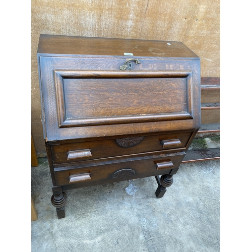 2993 - A MID 20TH CENTURY OAK BUREAU, 28