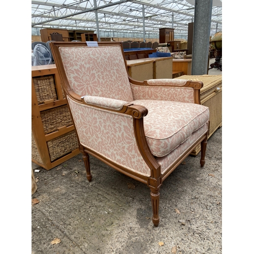 3079 - A VICTORIAN STYLE SATINWOOD FIRESIDE CHAIR ON TURNED AND FLUTED LEGS